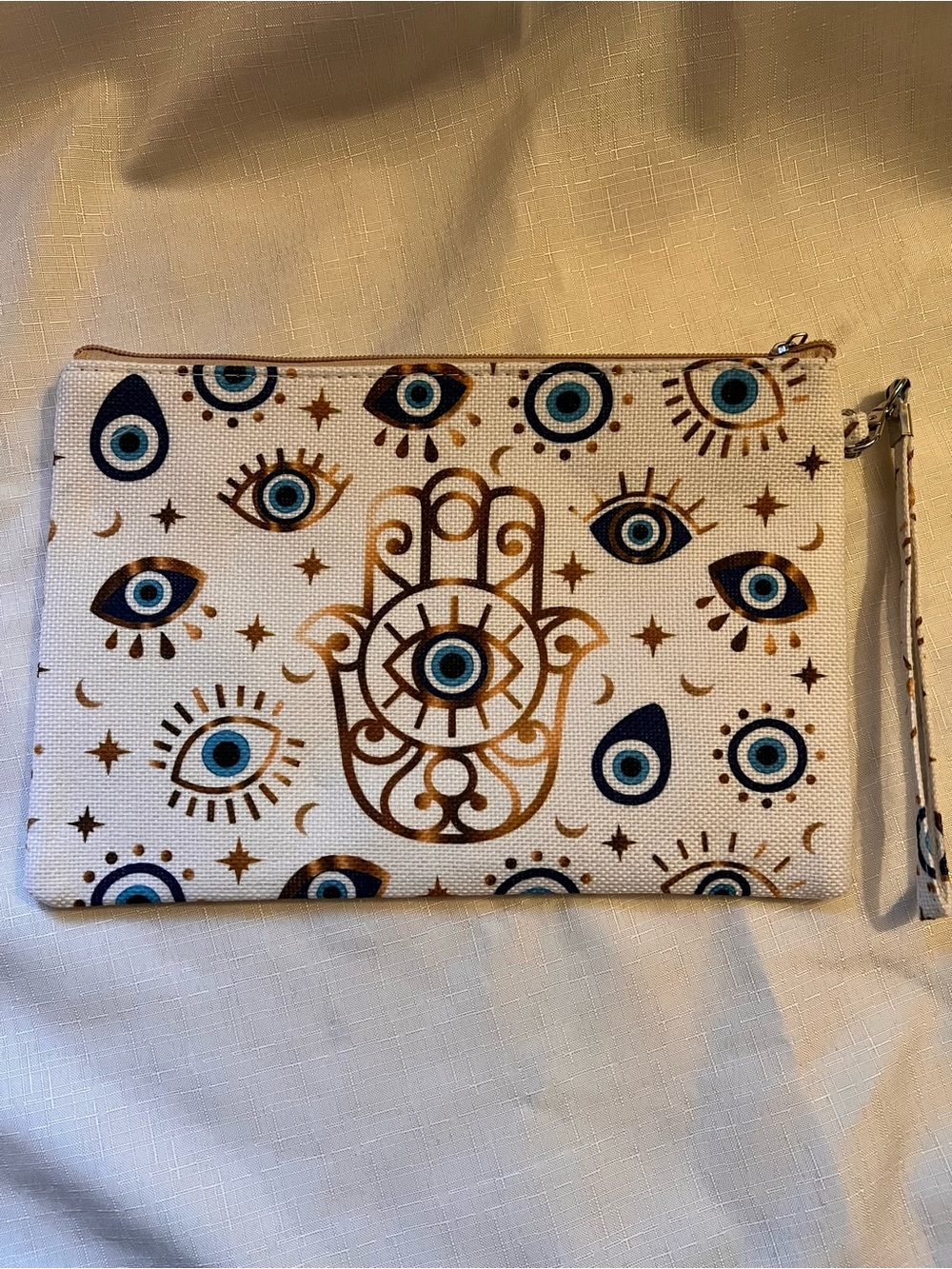 Evil Eye & Hamsa Wristlet Clutch in White with Blue and Gold Accents